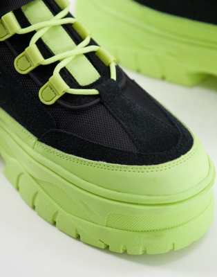 lime green and black boots