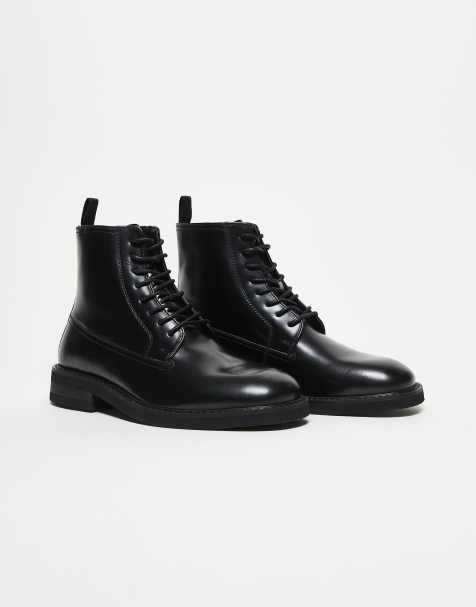 ASOS DESIGN lace up boots in black leather on cleated sole - view 1