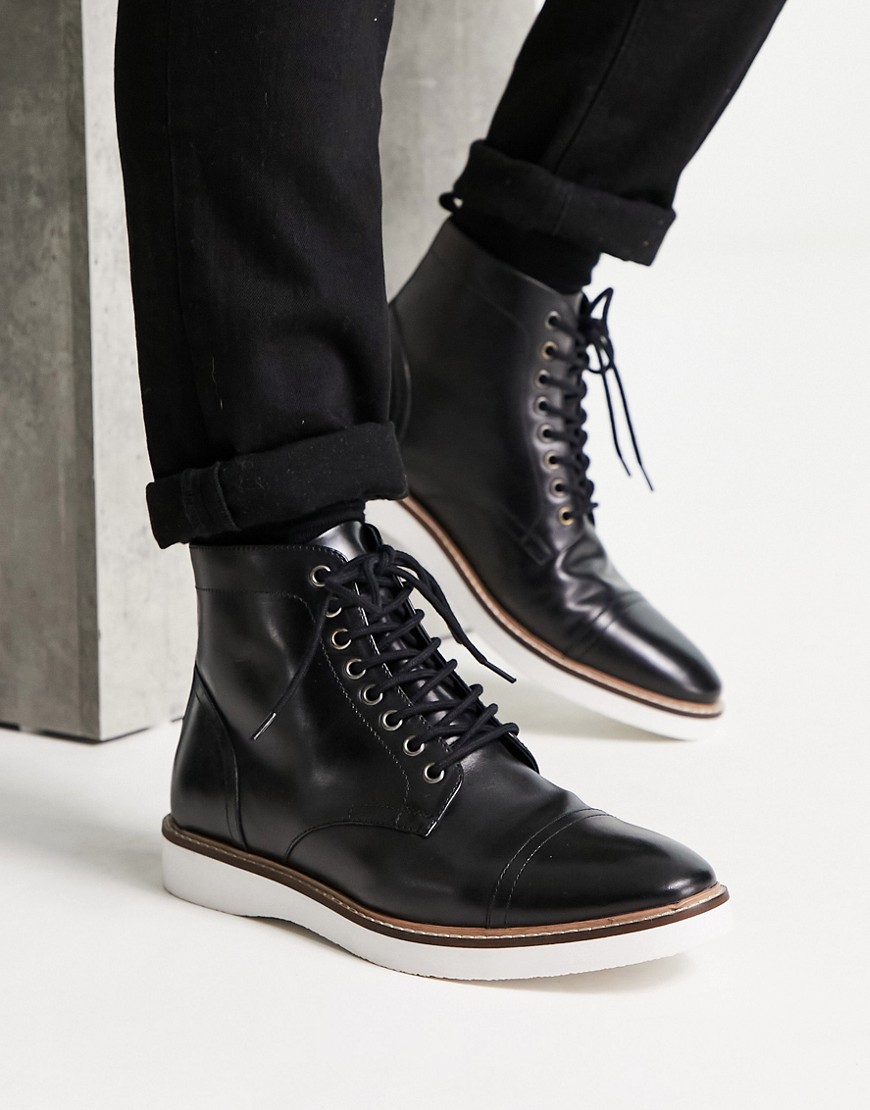 ASOS DESIGN lace up boots in black leather with white wedge sole