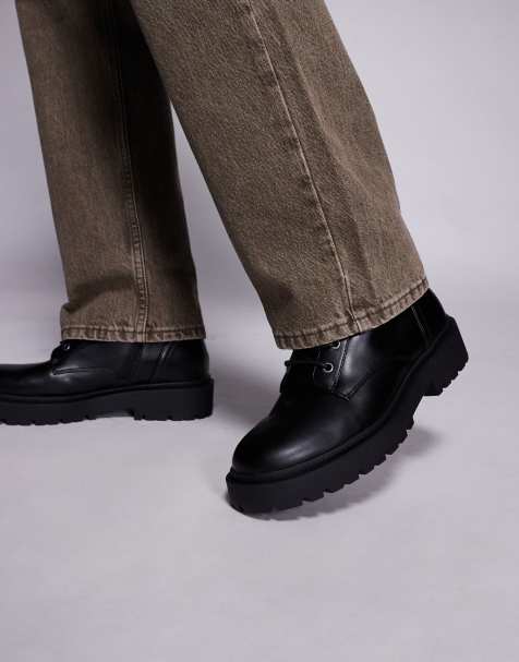 ASOS DESIGN lace up boots in black with chunky sole and strap - view 1