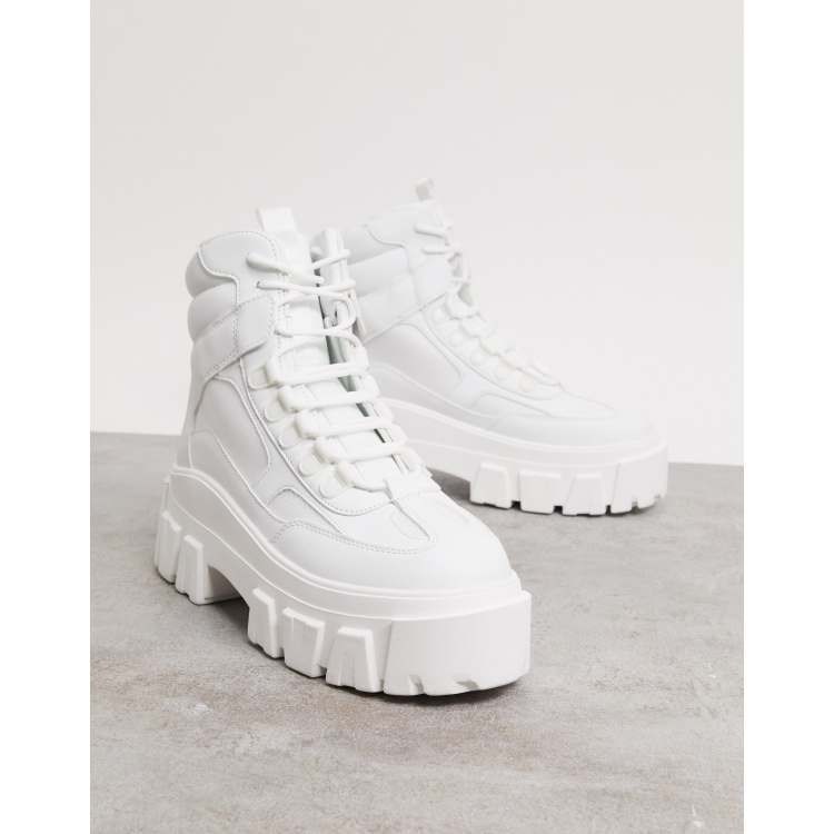 ASOS DESIGN lace-up sneakers in white with embossed monogram