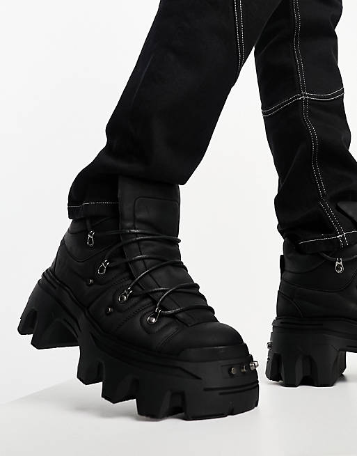 ASOS DESIGN lace up boots with metal hardware and chunky sole in black ...