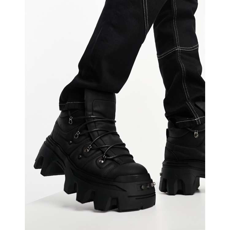 ASOS DESIGN lace up boots with metal hardware and chunky sole in