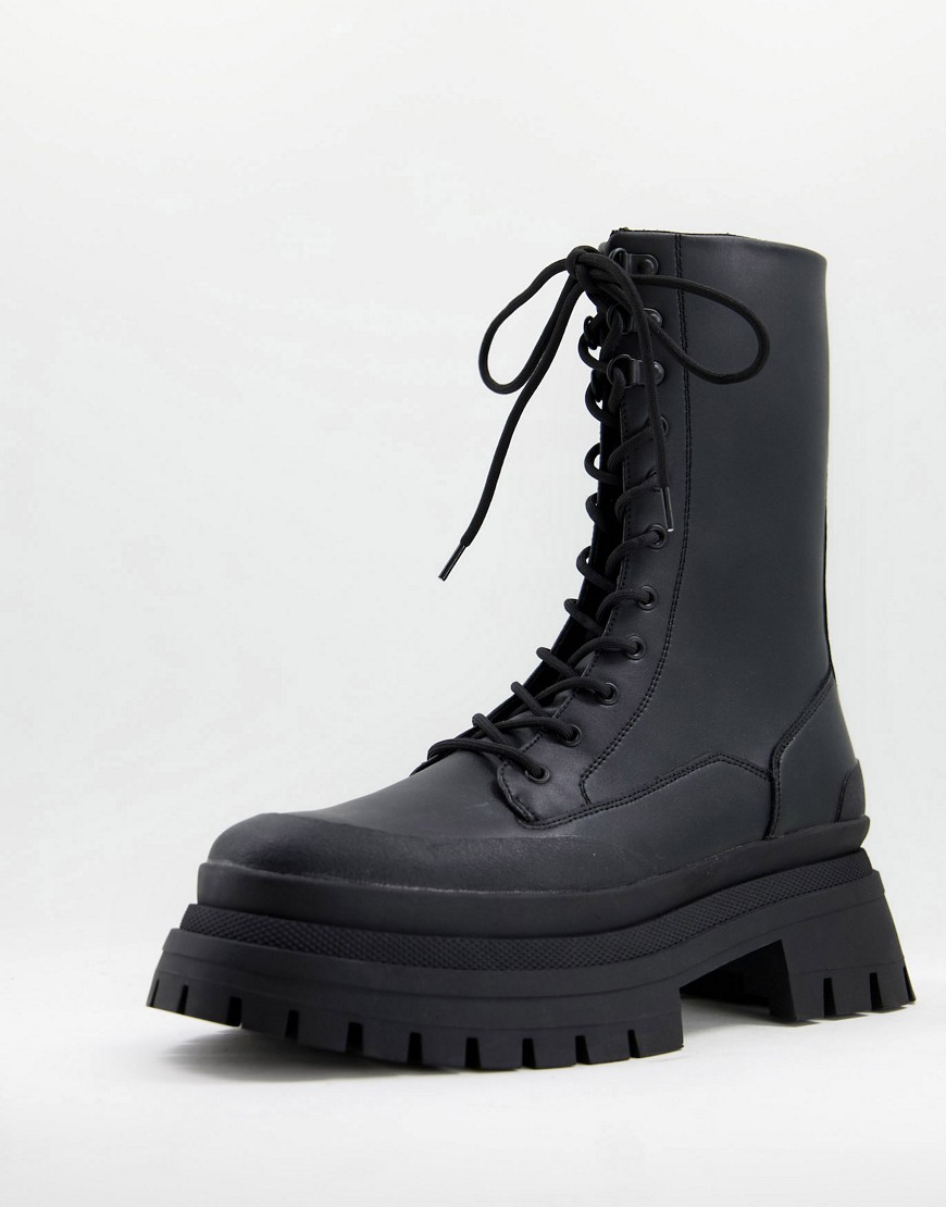 ASOS DESIGN lace-up calf boots on triple stacked sole with contrast stitching detail in black faux leather