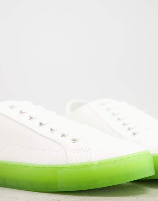 ASOS DESIGN lace up canvas shoes in white with green transparent sole