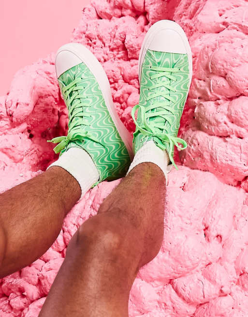 ASOS DESIGN lace up canvas sneakers in green print with chunky sole
