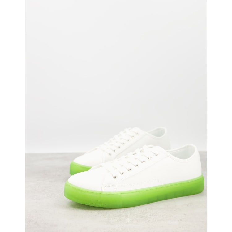 ASOS DESIGN sneakers in white with translucent blue sole