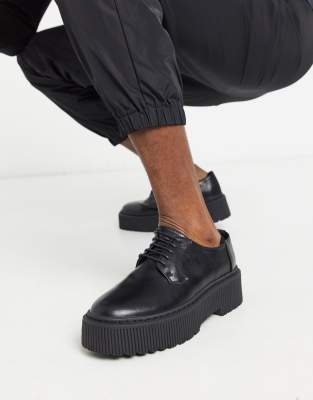 asos design trainer shoes in black leather with chunky sole