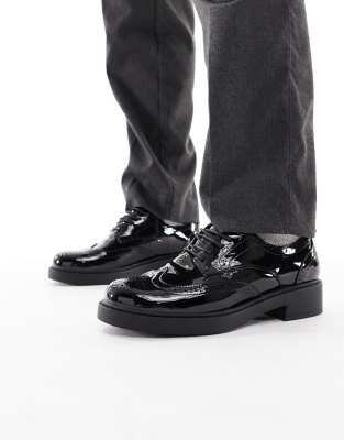 ASOS DESIGN lace up shoes in black with western brogue detailing