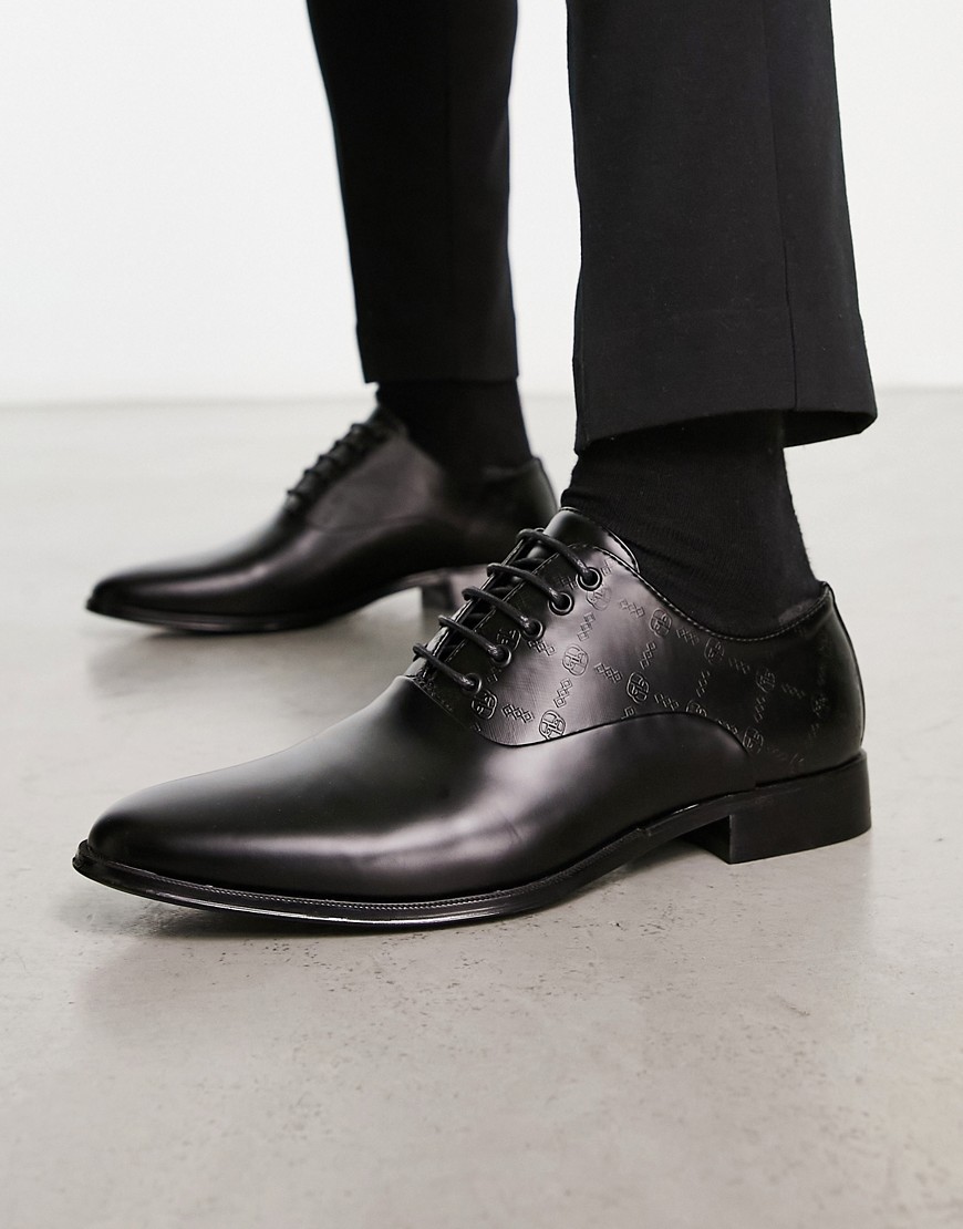 ASOS DESIGN lace up shoes with emboss design in black faux leather