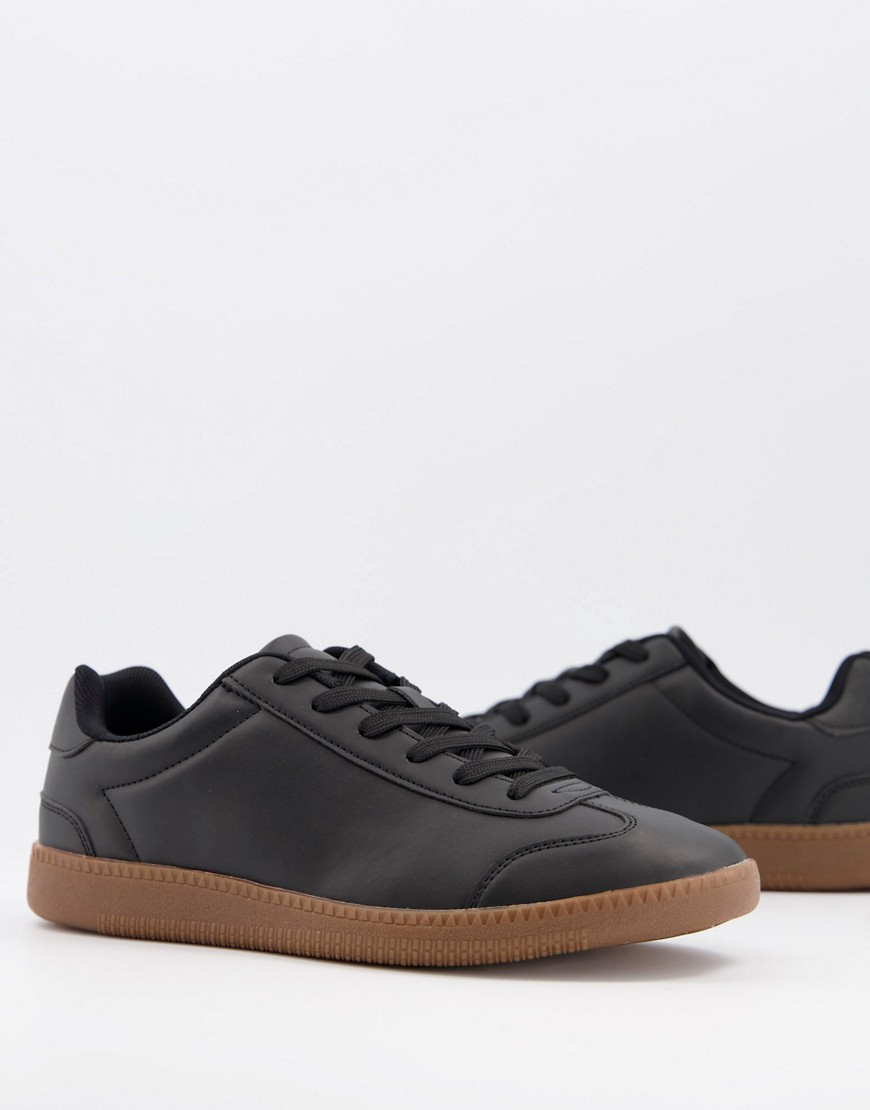 ASOS DESIGN lace up sneakers in black faux leather with gum sole