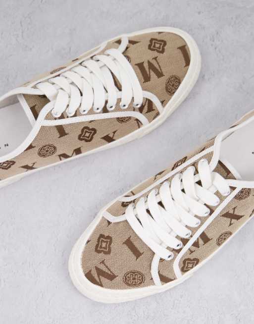 Sneakers with monogram print