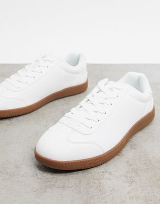 white sneakers with brown sole