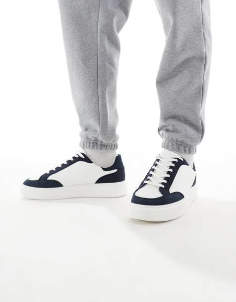 ASOS DESIGN lace-up sneakers in white with navy panelling - view 1