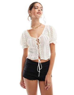 ASOS DESIGN lace up stitched top with puff sleeves in cream-White