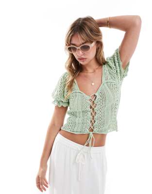 ASOS DESIGN lace up stitched top with puff sleeves in green