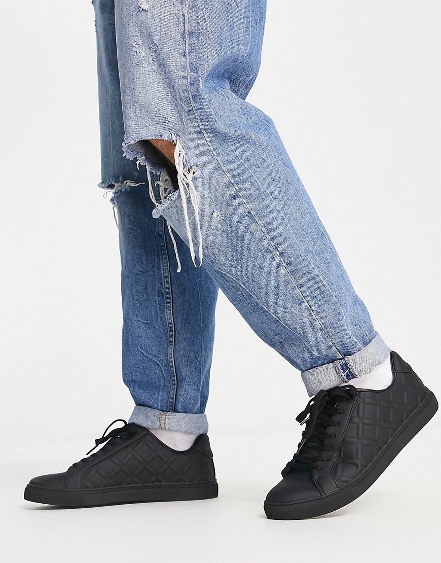 ASOS DESIGN lace up trainers in black with embossed panels