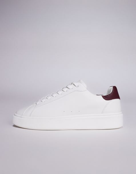 ASOS DESIGN lace up trainers in white with burgundy notch - view 1