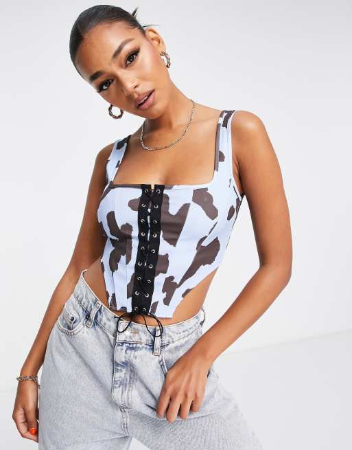 ASOS DESIGN lace up western corset top in cow print