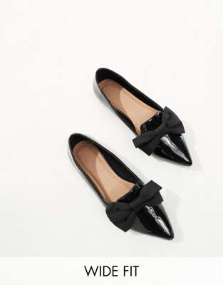 ASOS DESIGN - Lake - Spitze, flache Ballerinas mit Schleife in Schwarz, weite Passform