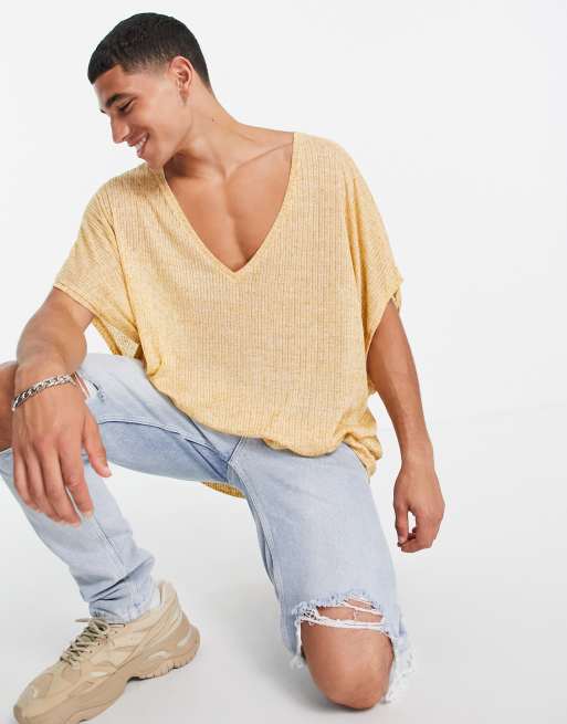 ASOS DESIGN - Lang oversized T-shirt met diepe V-hals in mosterdgele ribstof