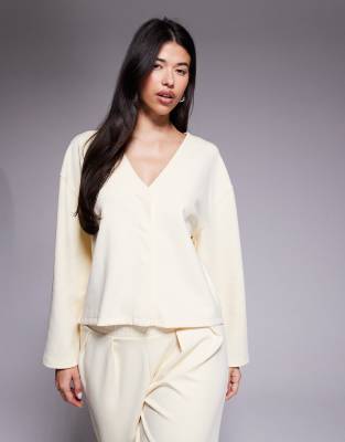 ASOS DESIGN - Langärmlige Interlock-Strickjacke in Cremeweiß mit kurzem Schnitt und V-Ausschnitt, Kombiteil
