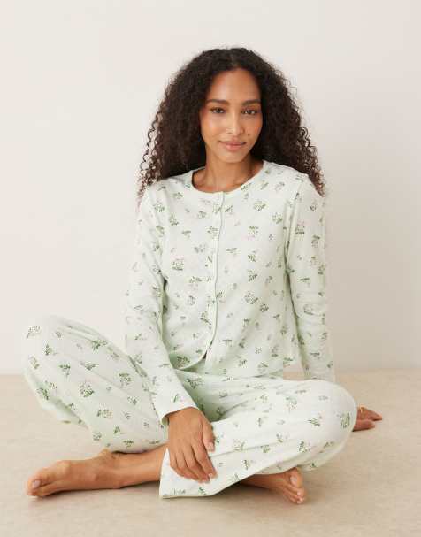 ASOS DESIGN – Langärmliger Pyjama mit Loch- und Mistelmuster - view 1