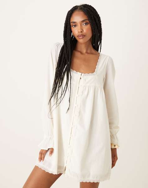 ASOS DESIGN – Langärmliges Babydoll-Minikleid aus Baumwolle in Ecru mit Spitzenborte - view 1