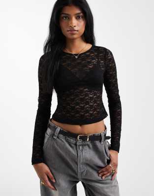 ASOS DESIGN - Langärmliges Cropped-Oberteil aus transparenter Spitze in Schwarz