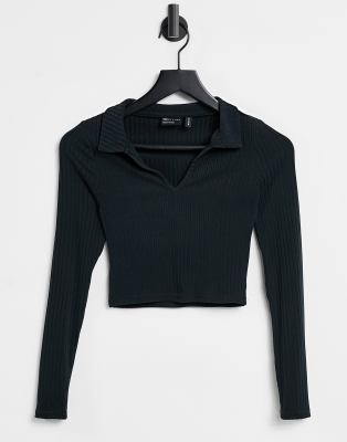 ASOS DESIGN - Langärmliges, figurbetontes Poloshirt mit Rippenstruktur in Schwarz