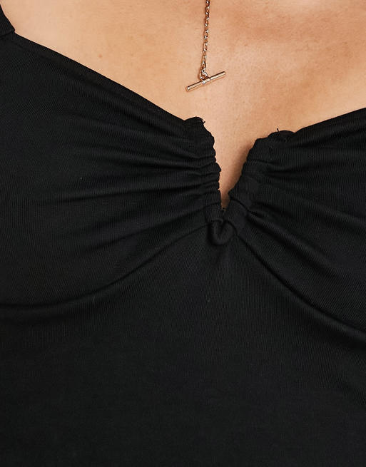 ASOS DESIGN – Langärmliges, kurzes Oberteil in Schwarz mit v-förmigem Draht-Detail, 3 von 4