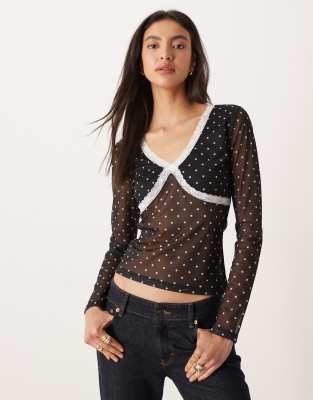 ASOS DESIGN - Langärmliges Oberteil aus Netzstoff in Schwarz mit Polka Dots und Spitzenbesatz