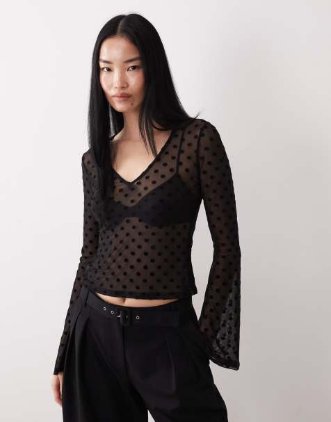 ASOS DESIGN – Langärmliges Oberteil aus transparentem Netzstoff in Schwarz mit beflockten Polka Dots - view 1
