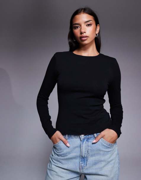 ASOS DESIGN – Langärmliges Oberteil in Schwarz mit Rundhalsausschnitt und Schulterpolstern - view 1