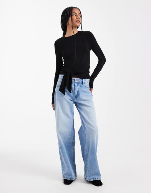 ASOS DESIGN – Langärmliges Oberteil in Schwarz mit verdrehtem Detail und asymmetrischem Saum, 2 von 4