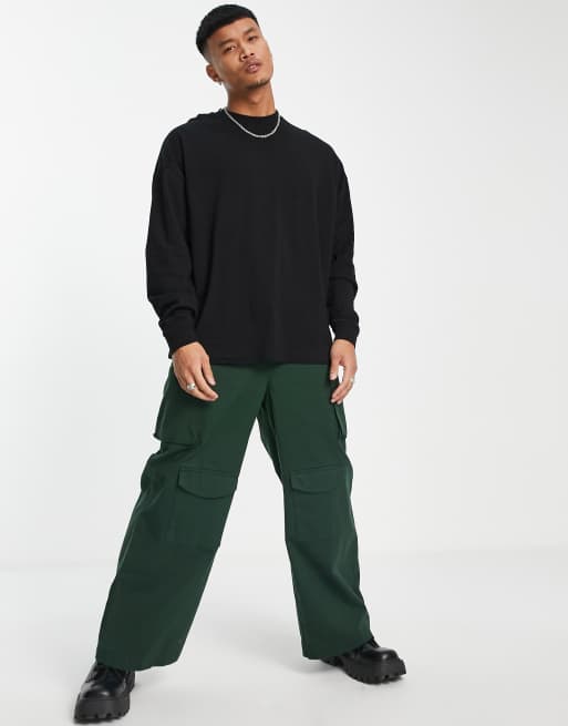 ASOS DESIGN – Langärmliges Oversize-Shirt in Schwarz mit Anime-Comicprint auf dem Rücken, 3 von 4