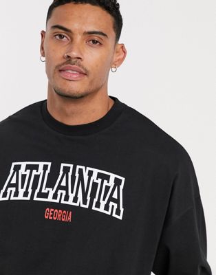 ASOS DESIGN – Langärmliges Oversize-Shirt in Schwarz mit „Atlanta”-Cityprint