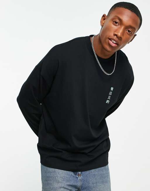 ASOS DESIGN – Langärmliges Oversize-Shirt in Schwarz mit Souvenir-Print vorne und hinten, 2 von 4