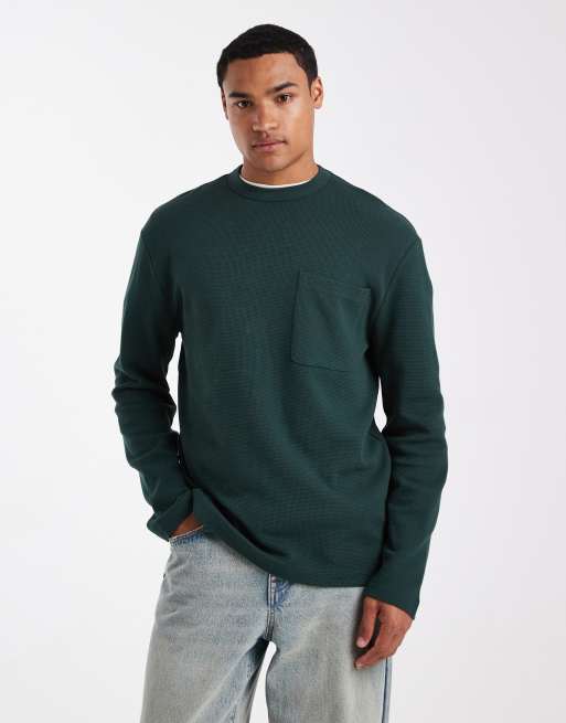 ASOS DESIGN – Langärmliges Relaxed-Fit-T-Shirt in Schwarz mit Waffelstruktur und Tasche