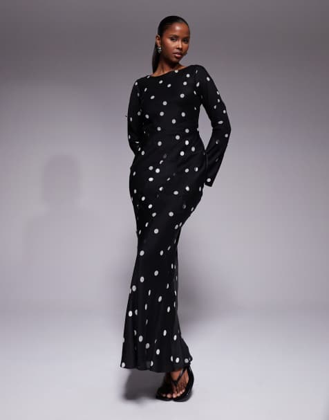 ASOS DESIGN – Langärmliges Satin-Maxikleid in Schwarz mit Punktemuster in Weiß, Bahnendesign, U-Boot-Ausschnitt und ungesäumten Kanten - view 1