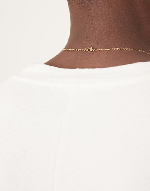 ASOS DESIGN – Langärmliges, strukturiertes T-Shirt in Weiß mit extremem Oversize-Schnitt, 3 von 4