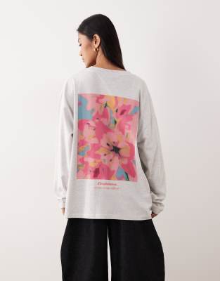 ASOS DESIGN - Langärmliges T-Shirt in Eisgrau meliert mit Blumengrafik