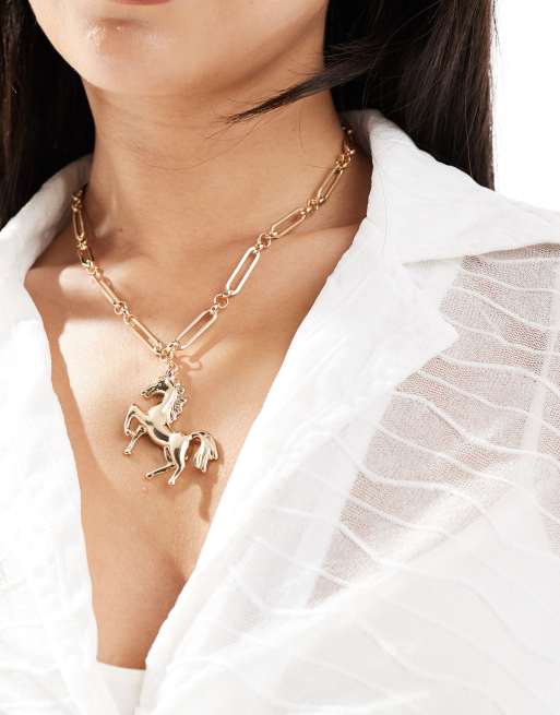 ASOS DESIGN - Lange ketting met paardhangertje in goudkleur