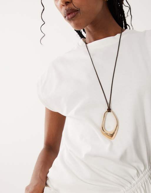 ASOS DESIGN - Lange ketting van koord met abstracte hanger in goudkleur, 4 van 4