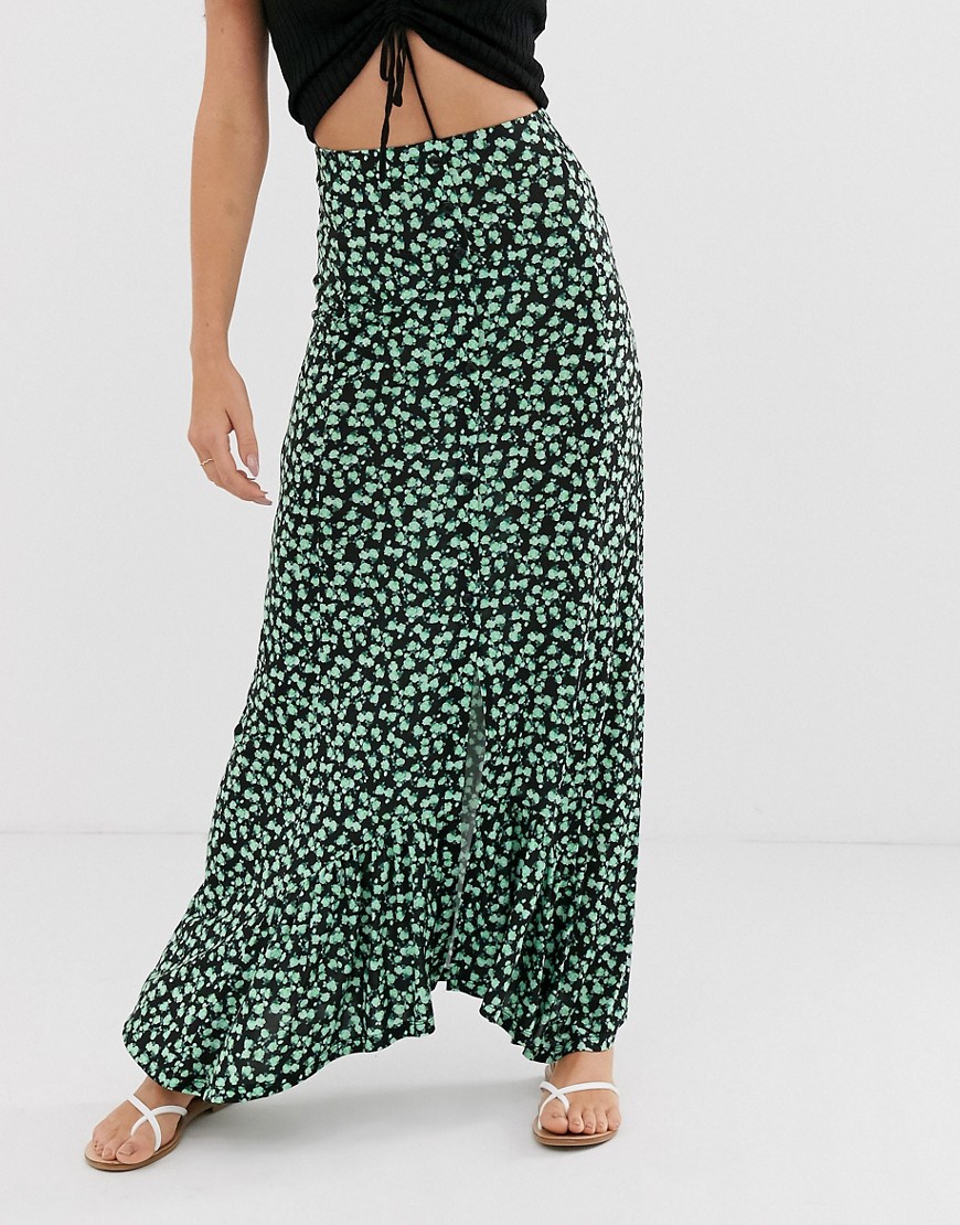 ASOS DESIGN - Lange rok met lange achterkant en knopen aan de voorkant in urban bloemenprint-Groen