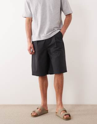 Länger geschnittene, elastische Jorts in Schwarz mit Bundfalten Schwarz M