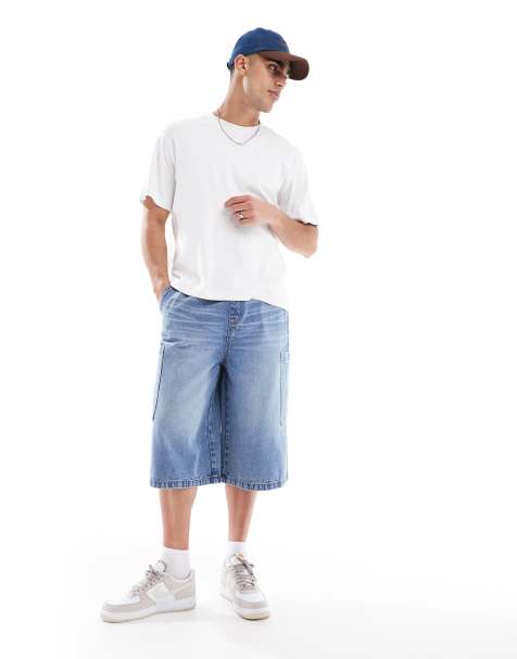 ASOS DESIGN – Länger geschnittene Jeans-Jorts in mittelblauer Waschung mit Cargotaschen - view 1