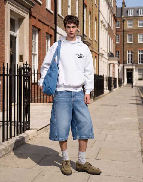 ASOS DESIGN – Länger geschnittene Jeans-Jorts in verwaschenem Mittelblau - view 1