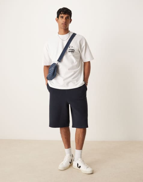 ASOS DESIGN – Länger geschnittene Oversize-Shorts in Marineblau mit Strukturmuster - view 1