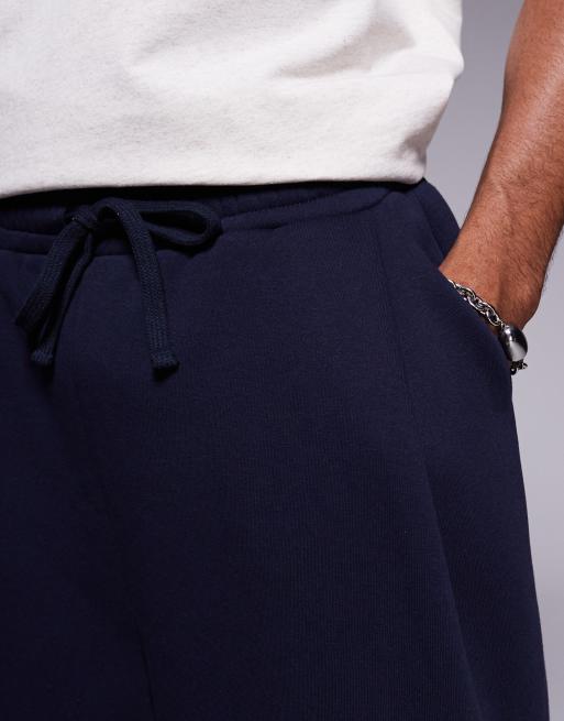 ASOS DESIGN oversized longer length shorts in navy